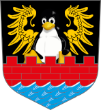 Tux up de Muer Emder Wappen mit dem Tux Maskottchen, anstelle des Engelkes